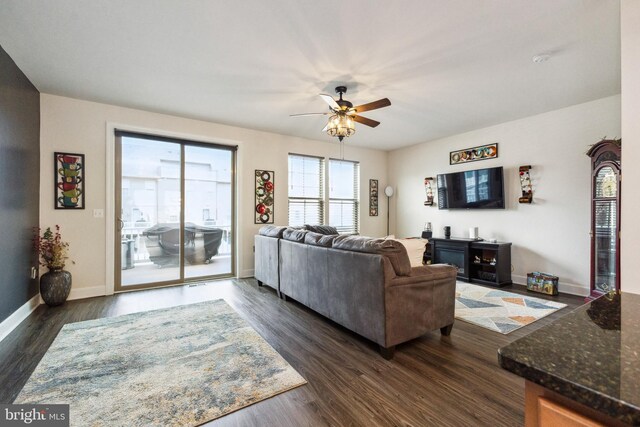 45394 Daveno Sq, Sterling, VA 20164 - living area featuring ceiling fan, dark wood finished floors, and baseboards