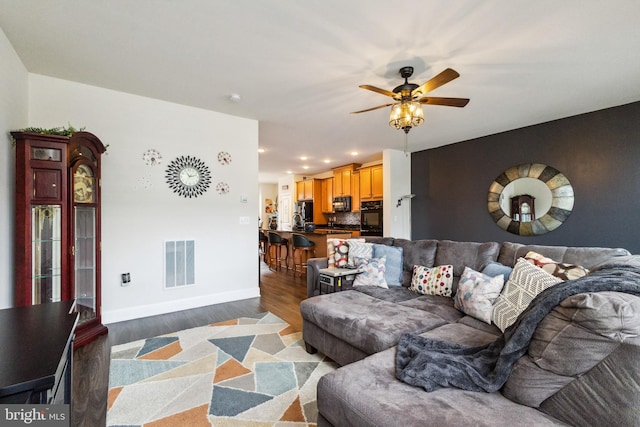 45394 Daveno Sq, Sterling, VA 20164 - living area featuring wood finished floors, baseboards, a ceiling fan, and recessed lighting