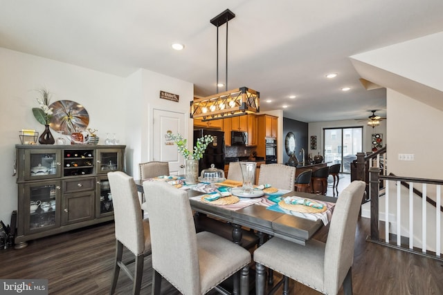 45394 Daveno Sq, Sterling, VA 20164 - dining space with dark wood finished floors, a ceiling fan, recessed lighting, and stairway