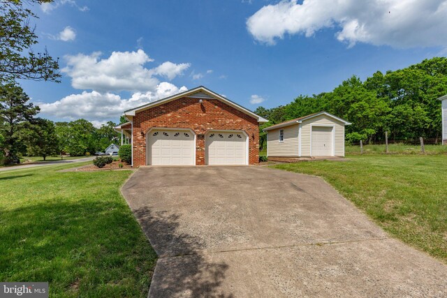 113 Kendallwood Dr, Fredericksburg, VA 22405 - view of side of home with brick siding, a lawn, and an outbuilding