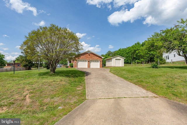 113 Kendallwood Dr, Fredericksburg, VA 22405 - view of front of house with brick siding, a garage, and an outdoor structure