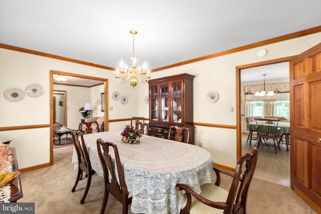 113 Kendallwood Dr, Fredericksburg, VA 22405 - dining area featuring a chandelier, light carpet, crown molding, and baseboards