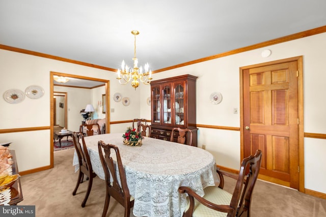 113 Kendallwood Dr, Fredericksburg, VA 22405 - dining room with light colored carpet, a chandelier, ornamental molding, and baseboards