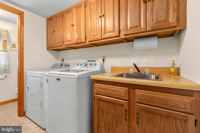 113 Kendallwood Dr, Fredericksburg, VA 22405 - laundry room featuring washing machine and dryer, cabinet space, and light flooring