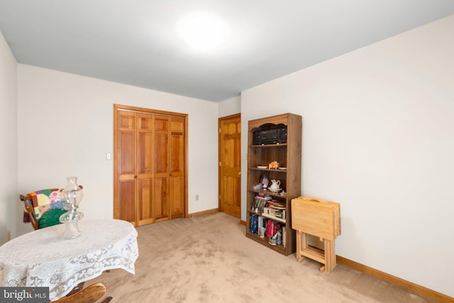 113 Kendallwood Dr, Fredericksburg, VA 22405 - bedroom with light carpet, a closet, and baseboards
