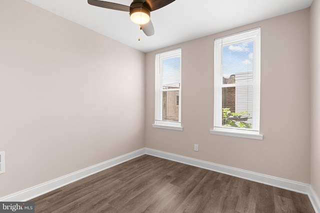 2032 S 21st St, Philadelphia, PA 19145 - spare room featuring dark wood finished floors, baseboards, and ceiling fan