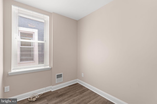 2032 S 21st St, Philadelphia, PA 19145 - spare room featuring dark wood-style floors and baseboards