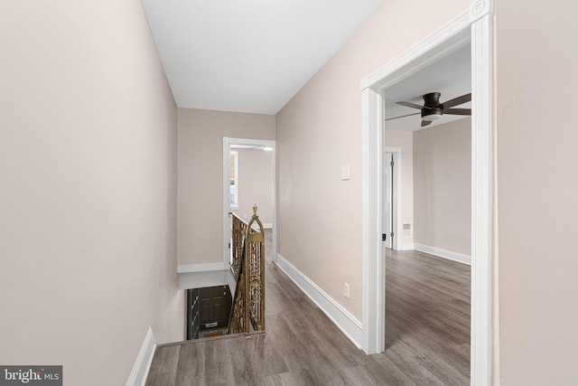2032 S 21st St, Philadelphia, PA 19145 - hall featuring an upstairs landing, wood finished floors, and baseboards