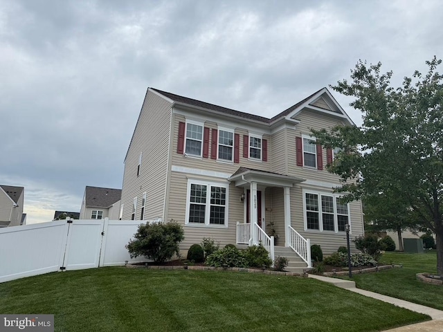 5829 Amanda Rose Ln, Woodbridge, VA 22193 - traditional-style house with a gate