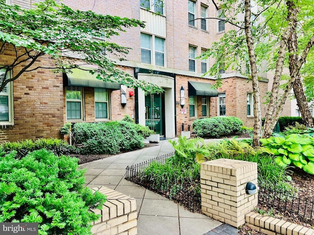 1314 Massachusetts Ave NW Unit G04, Washington, DC 20005 - property entrance featuring brick siding