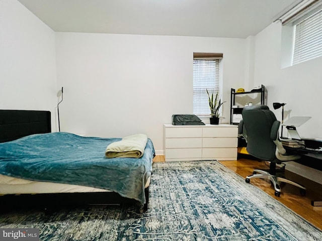 1314 Massachusetts Ave NW Unit G04, Washington, DC 20005 - bedroom with wood finished floors and an office area
