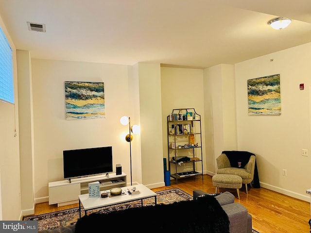 1314 Massachusetts Ave NW Unit G04, Washington, DC 20005 - living room with wood finished floors and baseboards