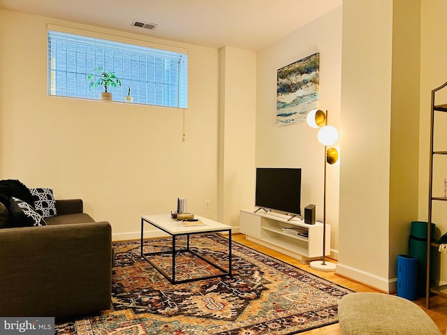 1314 Massachusetts Ave NW Unit G04, Washington, DC 20005 - living area featuring wood finished floors and baseboards