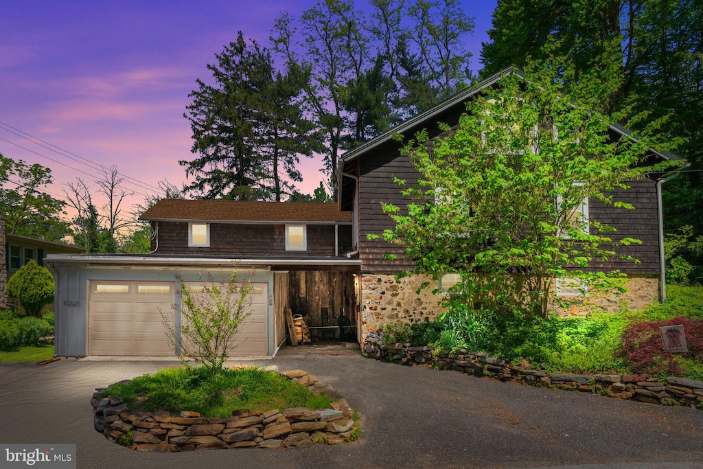 143 Station Rd, Cheyney, PA 19319 - view of front of house with driveway and stone siding