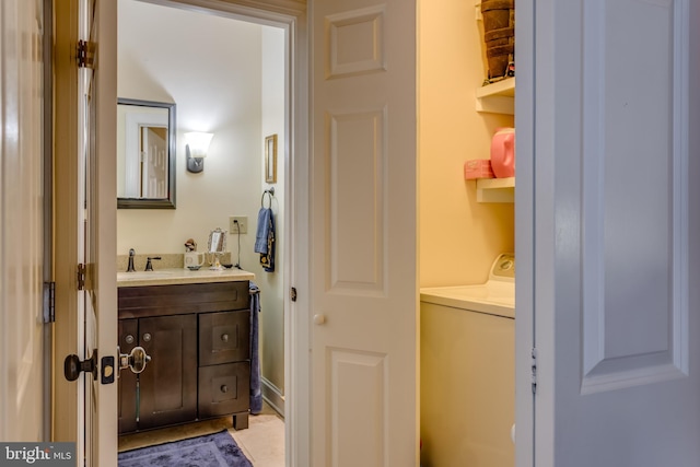 336 Miller St, Winchester, VA 22601 - bathroom with washer / clothes dryer and vanity