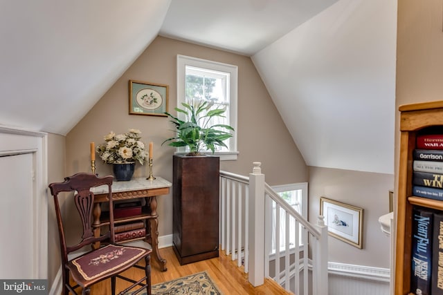 336 Miller St, Winchester, VA 22601 - living area with an upstairs landing, wood finished floors, and lofted ceiling