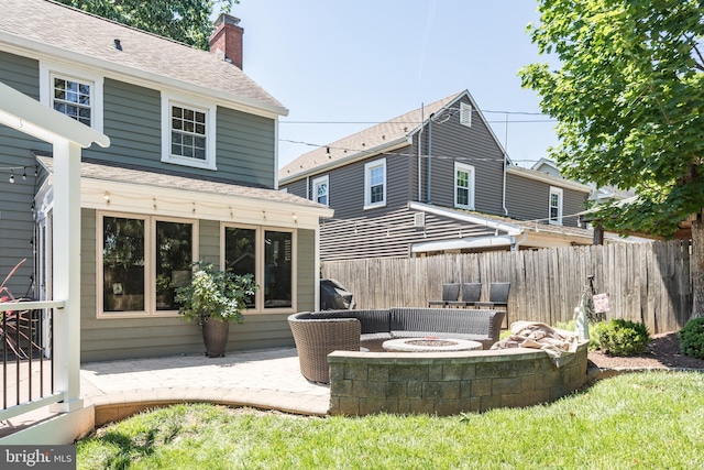 336 Miller St, Winchester, VA 22601 - rear view of property featuring an outdoor fire pit, a patio, a chimney, and a shingled roof
