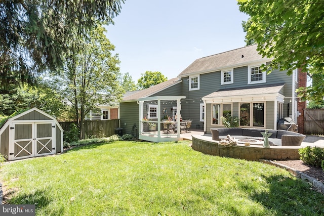 336 Miller St, Winchester, VA 22601 - rear view of house featuring an outdoor fire pit, a patio area, and a shingled roof
