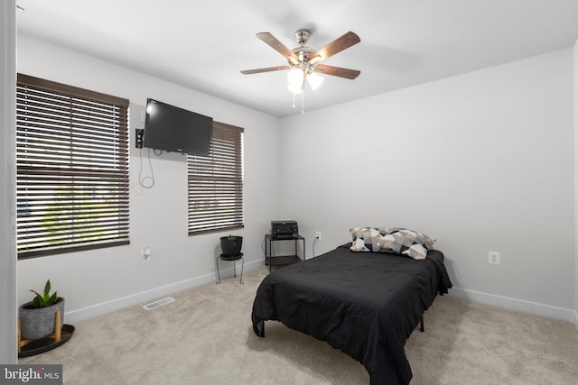 12037 Angora Dr, King George, VA 22485 - carpeted bedroom featuring baseboards and a ceiling fan