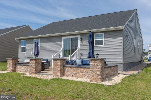 12037 Angora Dr, King George, VA 22485 - back of property featuring a lawn, a patio, and an outdoor hangout area