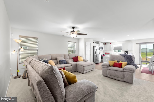12037 Angora Dr, King George, VA 22485 - living room with healthy amount of natural light, ceiling fan, recessed lighting, and light carpet