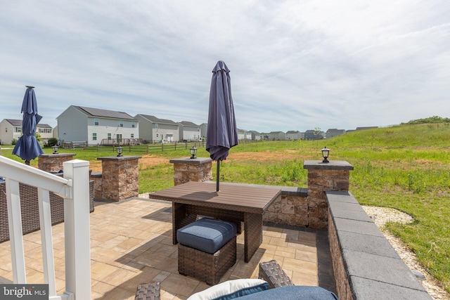 12037 Angora Dr, King George, VA 22485 - view of patio with outdoor dining area and a residential view
