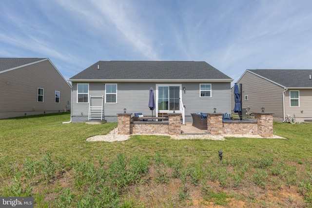 12037 Angora Dr, King George, VA 22485 - rear view of house with a patio and a yard