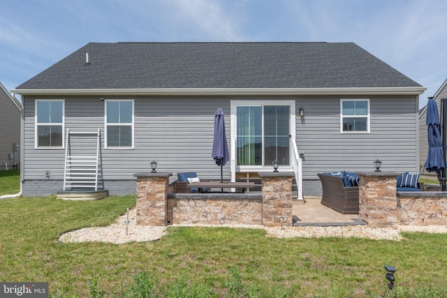 12037 Angora Dr, King George, VA 22485 - rear view of property featuring a yard, a patio area, and roof with shingles