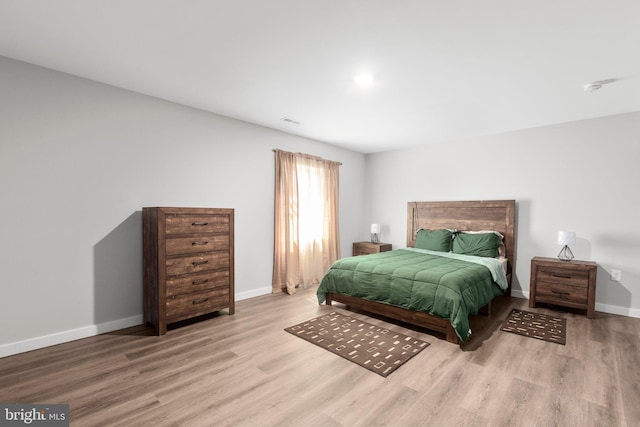 12037 Angora Dr, King George, VA 22485 - bedroom with wood finished floors and baseboards