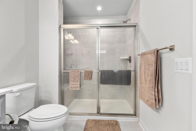 12037 Angora Dr, King George, VA 22485 - full bathroom with toilet, a stall shower, tile patterned flooring, and recessed lighting