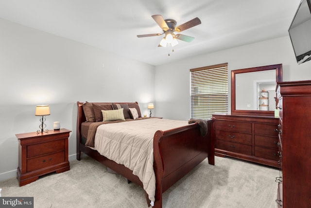 12037 Angora Dr, King George, VA 22485 - bedroom with light carpet, ceiling fan, and baseboards