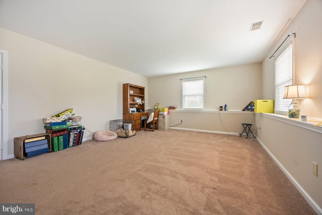 21 Bancroft St, Taneytown, MD 21787 - empty room with carpet floors, a desk, and baseboards