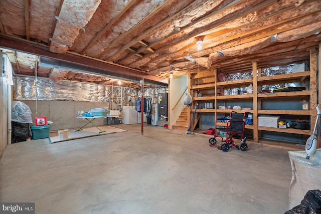 21 Bancroft St, Taneytown, MD 21787 - unfinished below grade area with stairway, heating unit, a sink, and washing machine and dryer