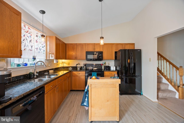 21 Bancroft St, Taneytown, MD 21787 - kitchen with black appliances, a sink, lofted ceiling, light wood-type flooring, and hanging light fixtures