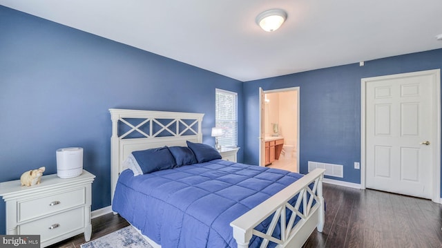 628 E Regency Dr, Absecon, NJ 08205 - bedroom featuring wood finished floors, baseboards, and connected bathroom