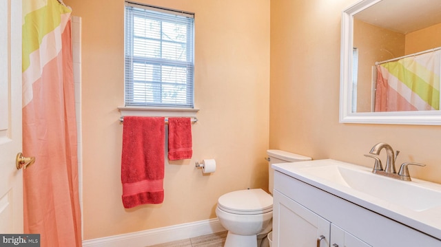 628 E Regency Dr, Absecon, NJ 08205 - bathroom featuring baseboards, toilet, vanity, and a shower with shower curtain