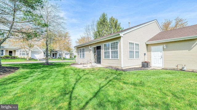 628 E Regency Dr, Absecon, NJ 08205 - back of property featuring a yard