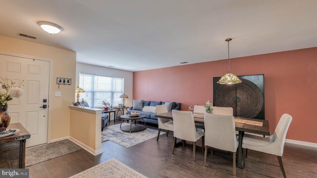628 E Regency Dr, Absecon, NJ 08205 - dining area with dark wood finished floors and baseboards