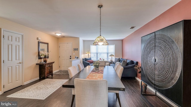 628 E Regency Dr, Absecon, NJ 08205 - dining room with dark wood-style flooring and baseboards