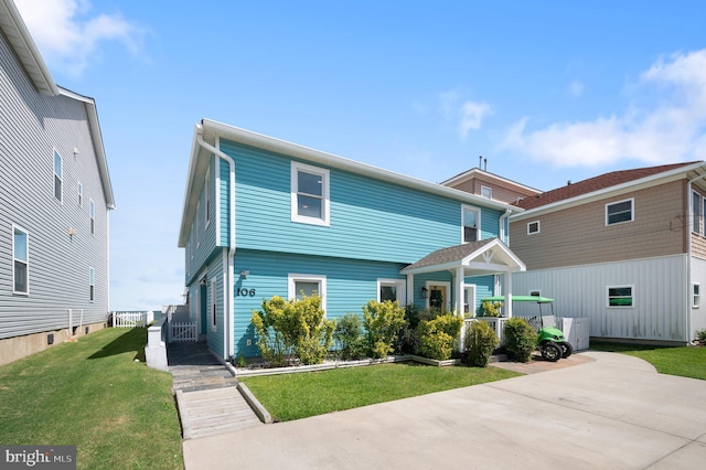 106 Lighthouse Dr, Hampton, VA 23664 - view of front facade featuring a front yard