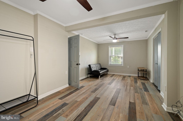 106 Lighthouse Dr, Hampton, VA 23664 - living area featuring ceiling fan, wood finished floors, baseboards, and ornamental molding