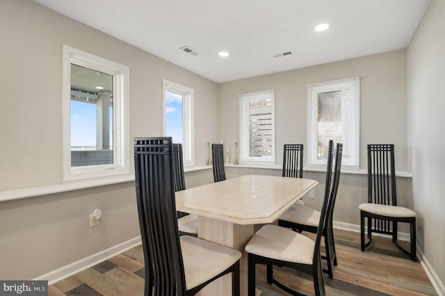 106 Lighthouse Dr, Hampton, VA 23664 - dining room featuring wood finished floors, baseboards, and recessed lighting