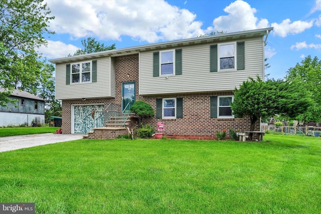 3111 Jessica Rd, Dover, PA 17315 - split foyer home with brick siding and a front lawn