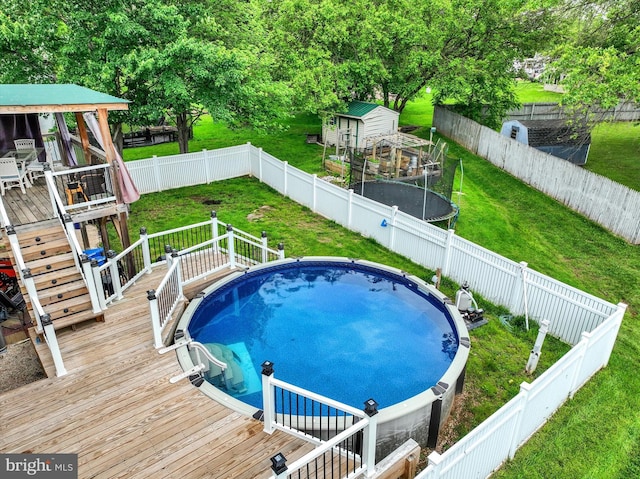 3111 Jessica Rd, Dover, PA 17315 - view of pool with a deck and a trampoline