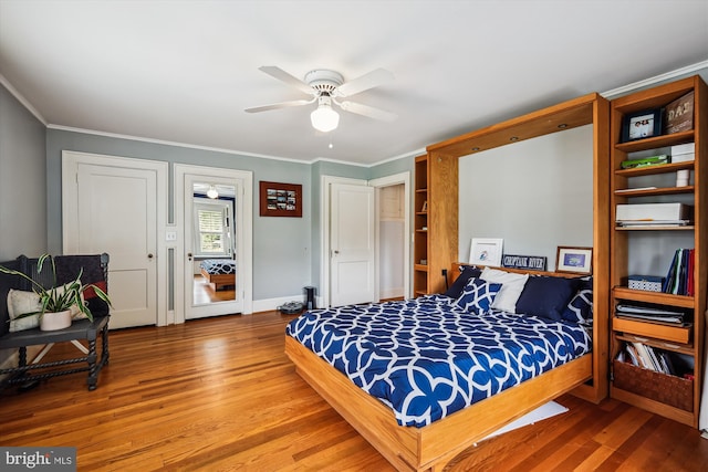 23274 Holly Park Dr, Preston, MD 21655 - bedroom featuring wood finished floors, ornamental molding, baseboards, and a ceiling fan