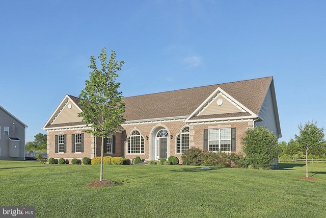 11202 King Gallahan Ct, Clinton, MD 20735 - view of front of home with brick siding and a front yard