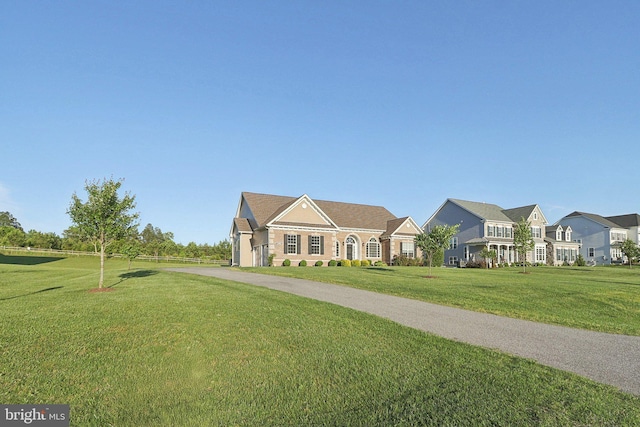 11202 King Gallahan Ct, Clinton, MD 20735 - view of front facade with a front yard and driveway