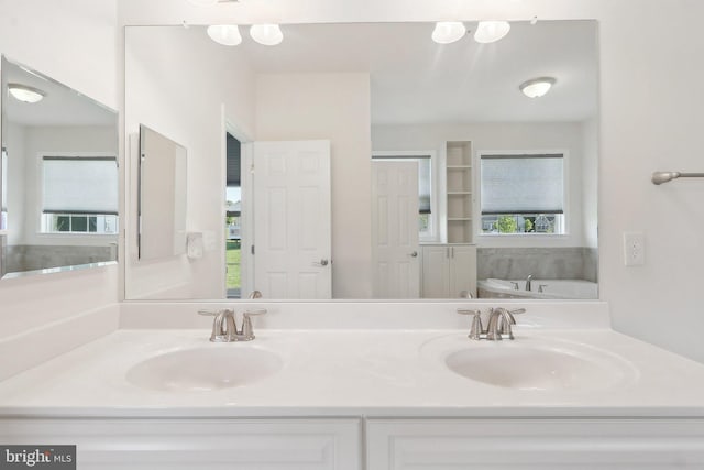11202 King Gallahan Ct, Clinton, MD 20735 - full bathroom with double vanity and a garden tub