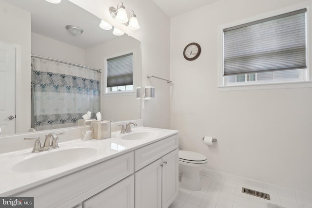 11202 King Gallahan Ct, Clinton, MD 20735 - full bathroom with tile patterned flooring, double vanity, toilet, baseboards, and a shower with curtain