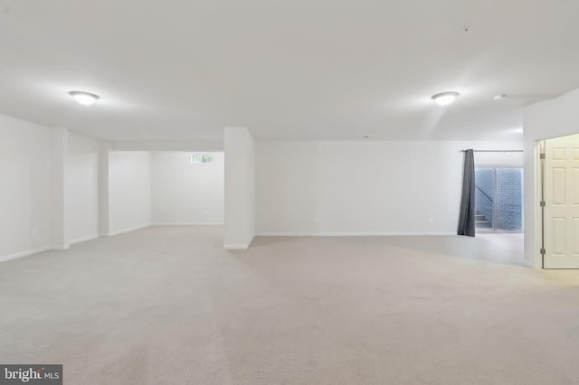 11202 King Gallahan Ct, Clinton, MD 20735 - below grade area featuring light colored carpet and baseboards